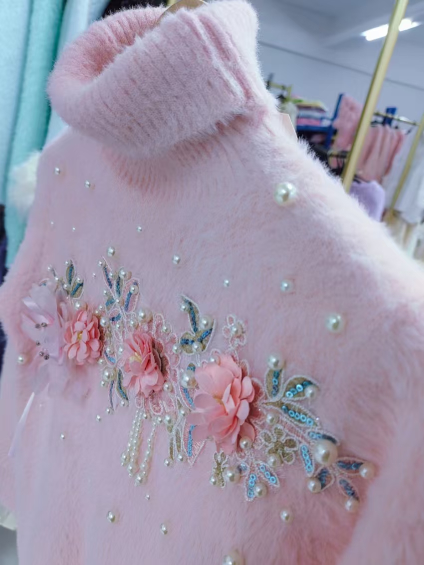 Maglione Rosa a Collo Alto Ade - Winter Clothing Photo recensione e prezzo