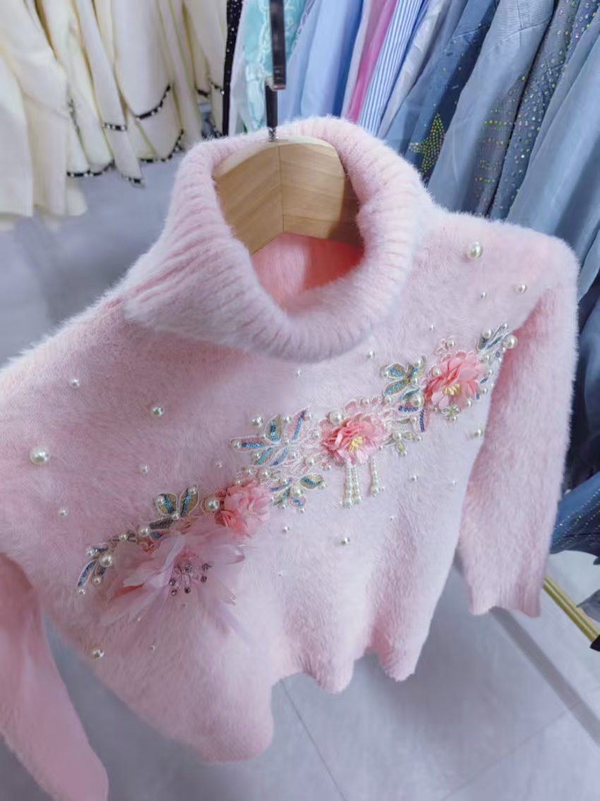 Maglione Rosa a Collo Alto Ade - Winter Clothing Photo recensione e prezzo