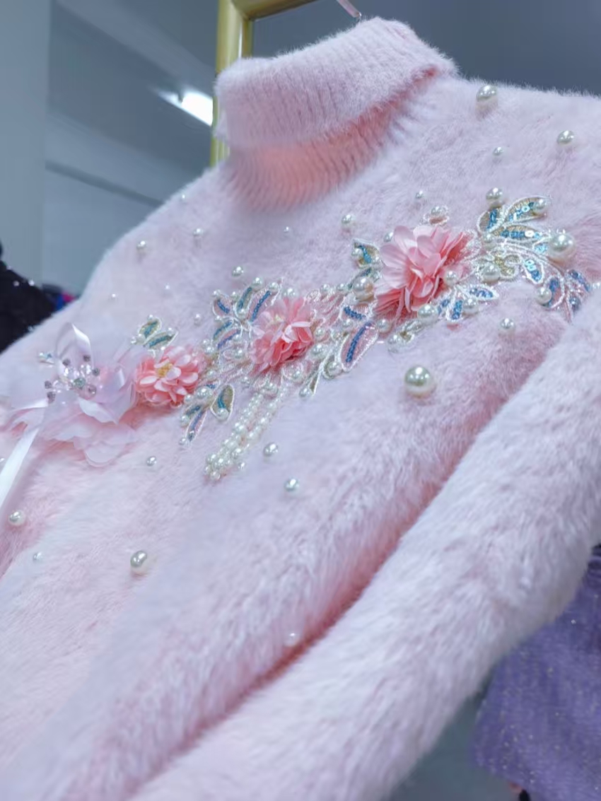 Maglione Rosa a Collo Alto Ade - Winter Clothing Photo recensione e prezzo